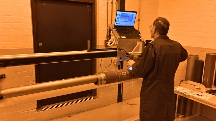 SPGPrints laboratory specialist verifying a certified precision rotary screen process